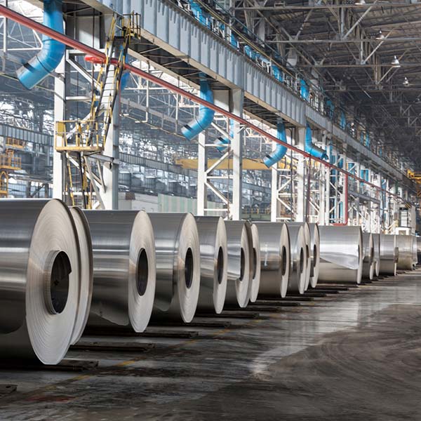 Metal Processing Rolls of metal sheet laying on a manufacturing site