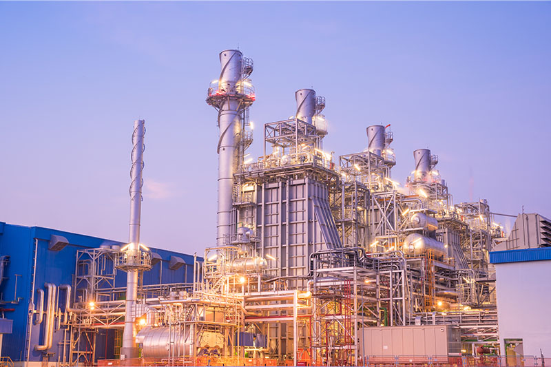 Petroleum Refinerie Outside view of a petroleum refinery at sunset.