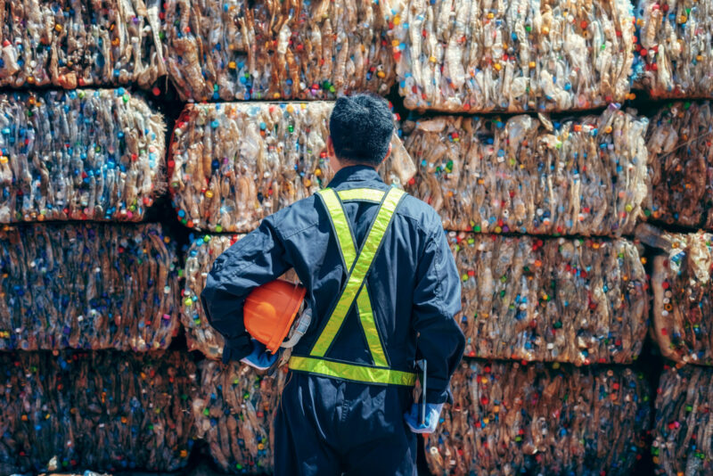 Engineer,Standing,And,Looking,Back,The,Plastic,Bottle,In,The Engineer,Standing,And,Looking,Back,The,Plastic,Bottle,In,The