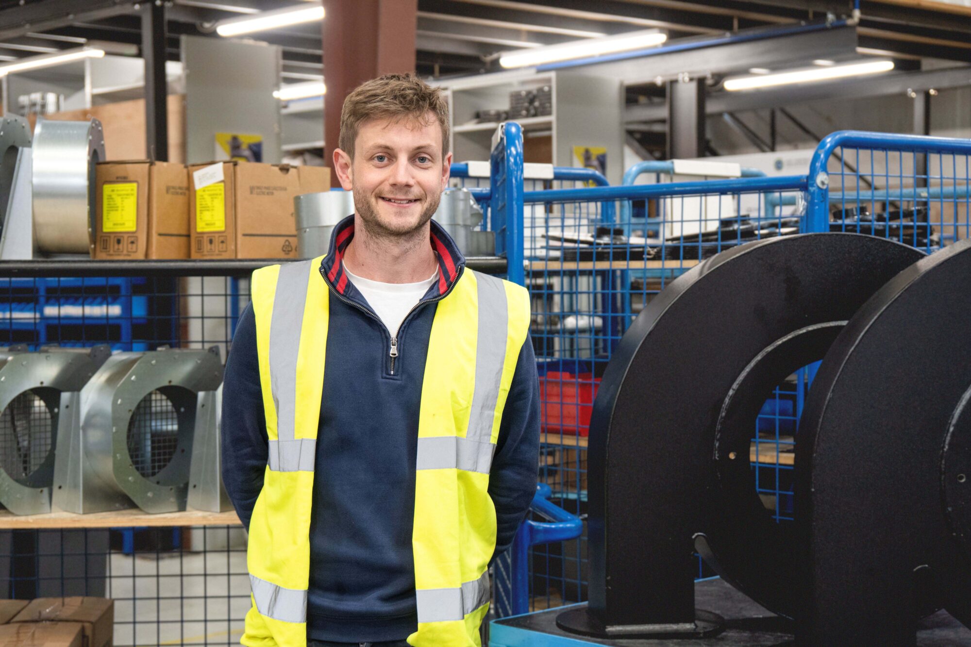 Mat Ayres_Innovation_Engineering_Manager Mat Ayres, Innovation & Engineering Manager at Air Control Industries, with graduate engineer in the manufacturing facility.